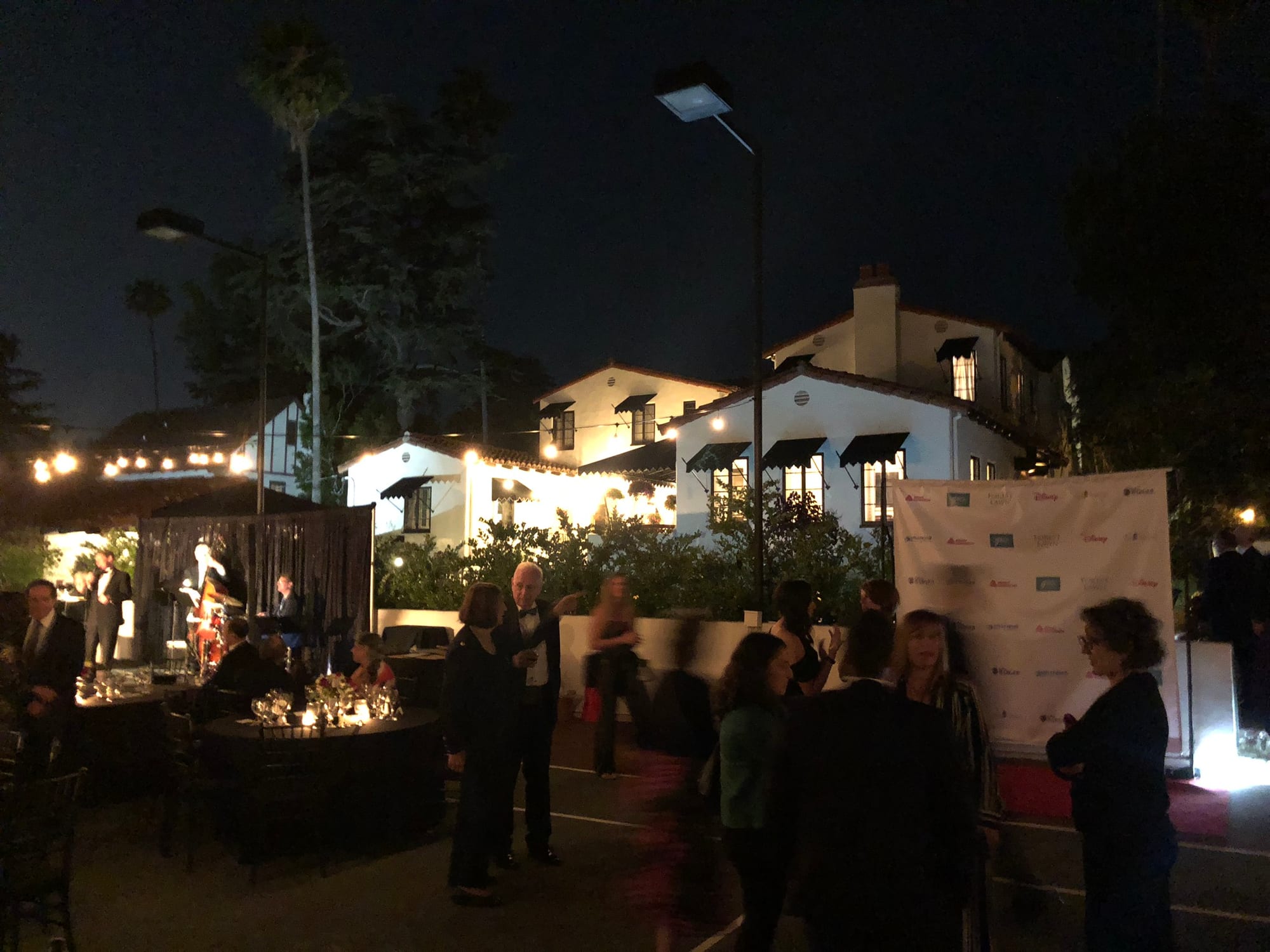 Evening reception on the grounds beneath the estate facade