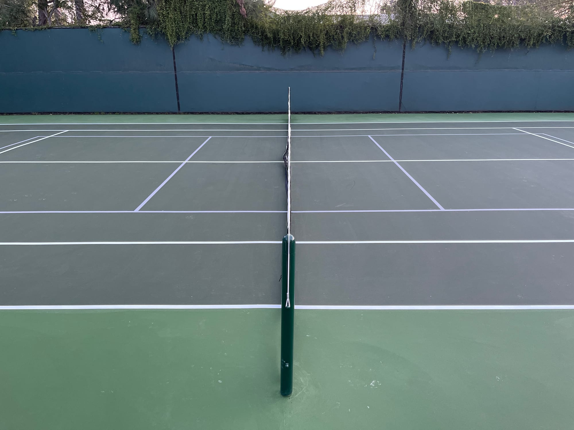 Full-size tennis court on the property