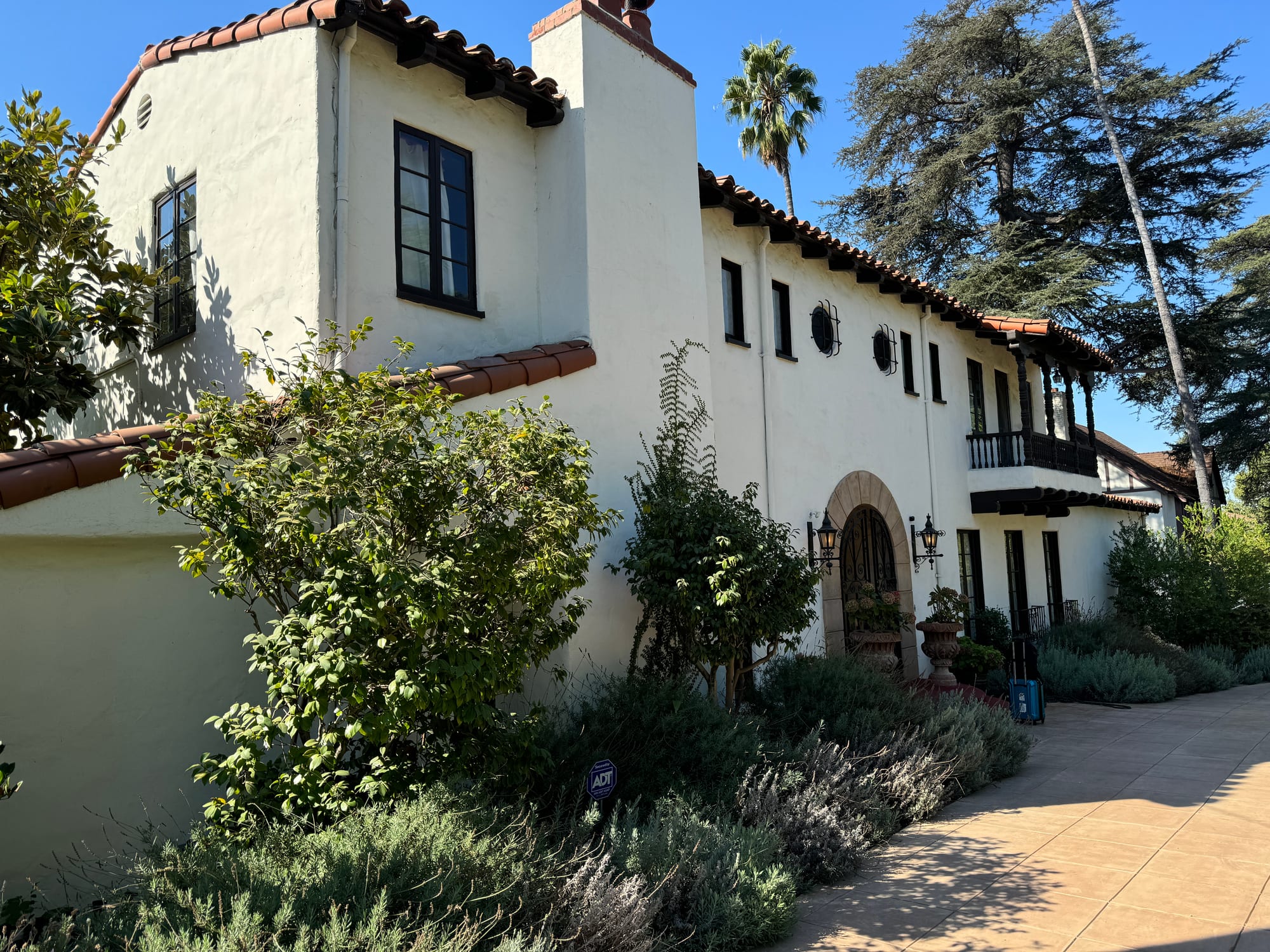 Side elevation of the house with mature landscaping