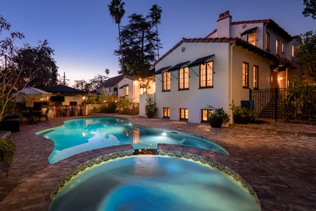 Curved pool and spa at twilight