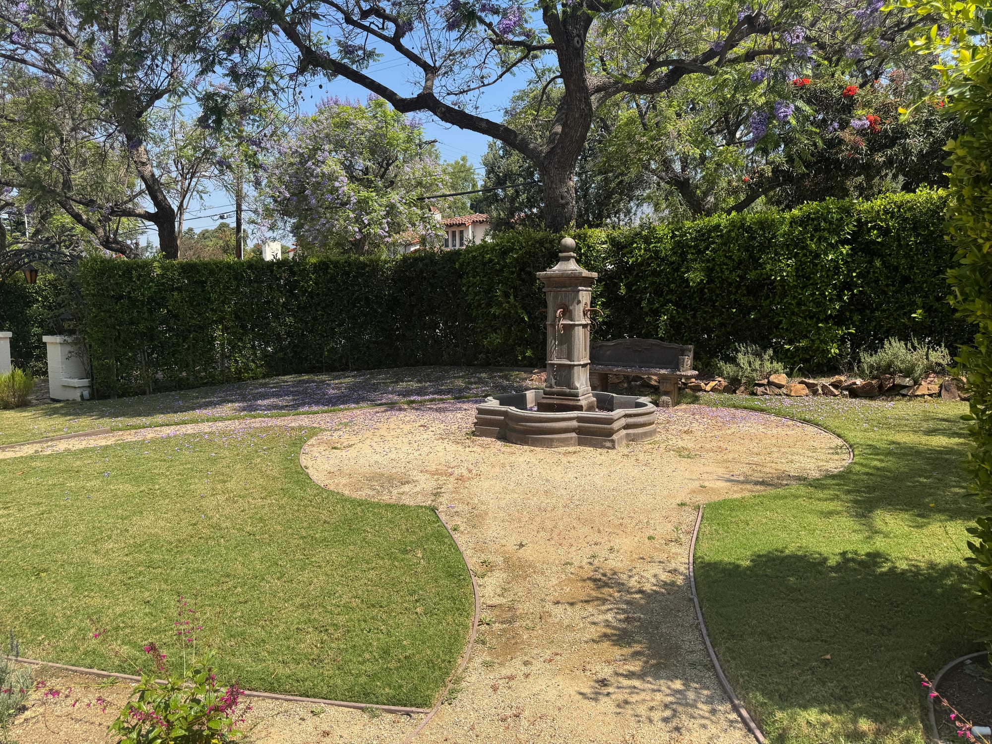Central fountain in a landscaped courtyard